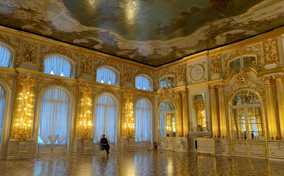 An oppulent, gold-encrusted ballroom in St. Petersburg